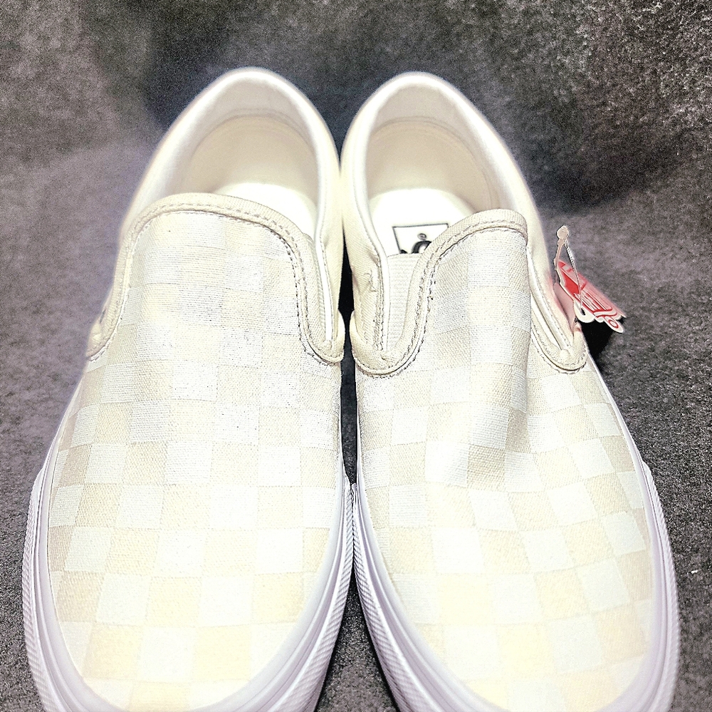 Vans Slip-On Skate shoe in a white color with a reflective checkerboard pattern. - Picture 2 of 5